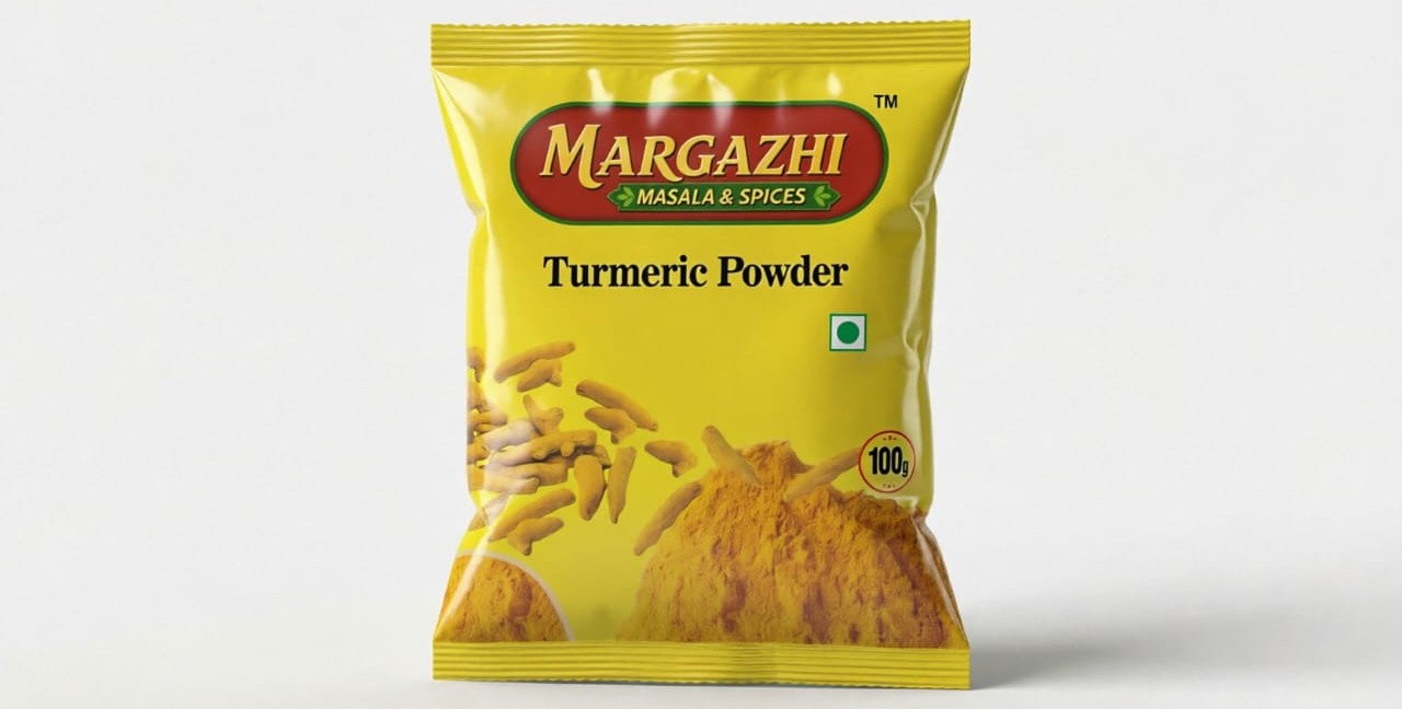 Bright yellow turmeric powder in a bowl